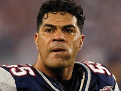 New England linebacker Seau is seen before the start of the NFL's Super Bowl XLII football game in Glendale