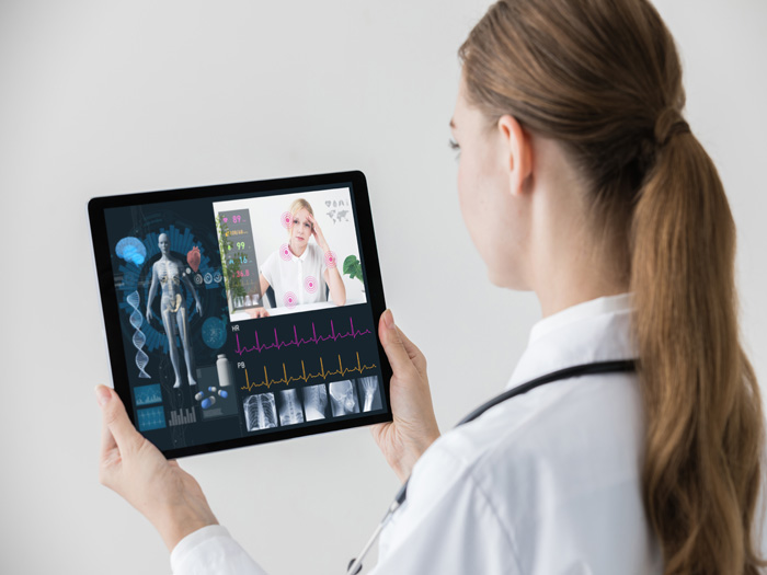women viewing patient via telemedicine