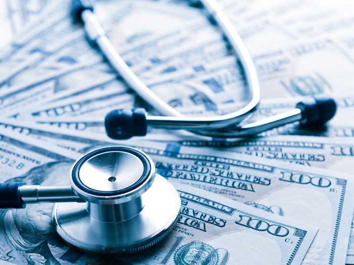 The cost of healthcare. Blue toned