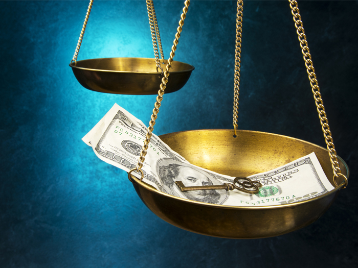 Money tipping the scales of justice