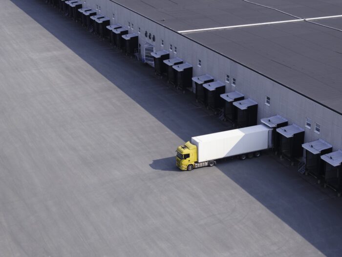 single semi truck at distribution warehouse