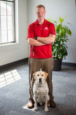 Timothy Fallon and service dog