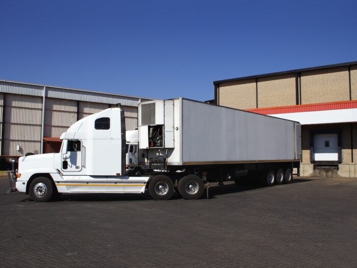 semi-truck at warehouse dock