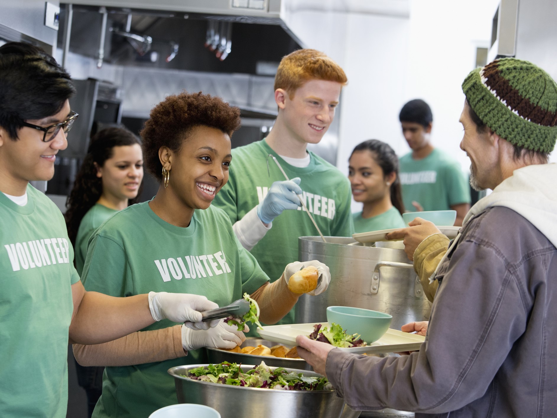 Volunteers working in soup kitchen
