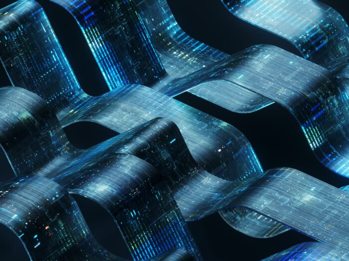 Digitally generated image of an intricate, abstract design featuring several interconnected, ribbon-like structures that appear to flow in a fluid, wave-like pattern