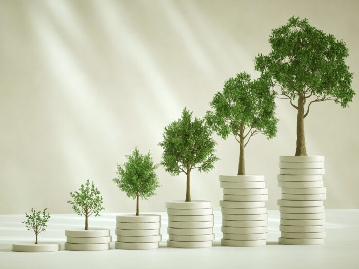 abstract growing bar graph made out of discs with trees on them visualising process of growing and success