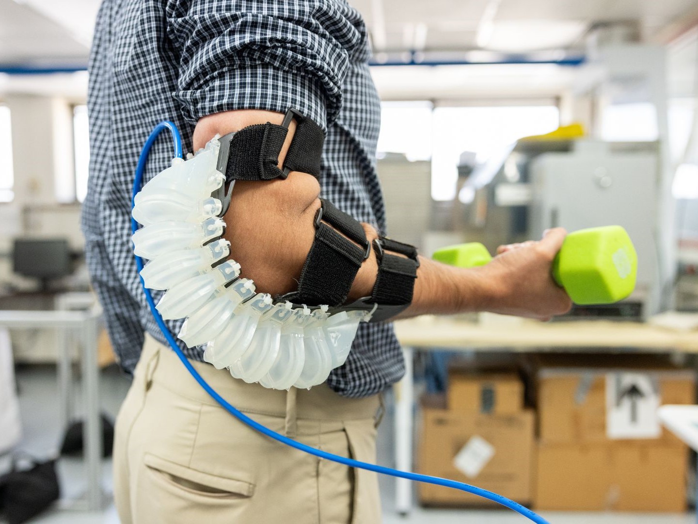 The Pneumatically Actuated Soft Elbow Exoskeleton (PASE)