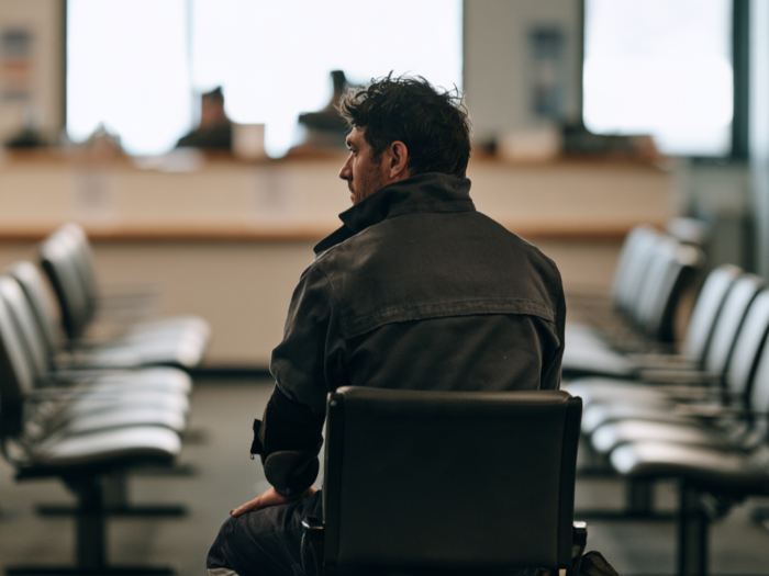 injured worker waiting for care concept